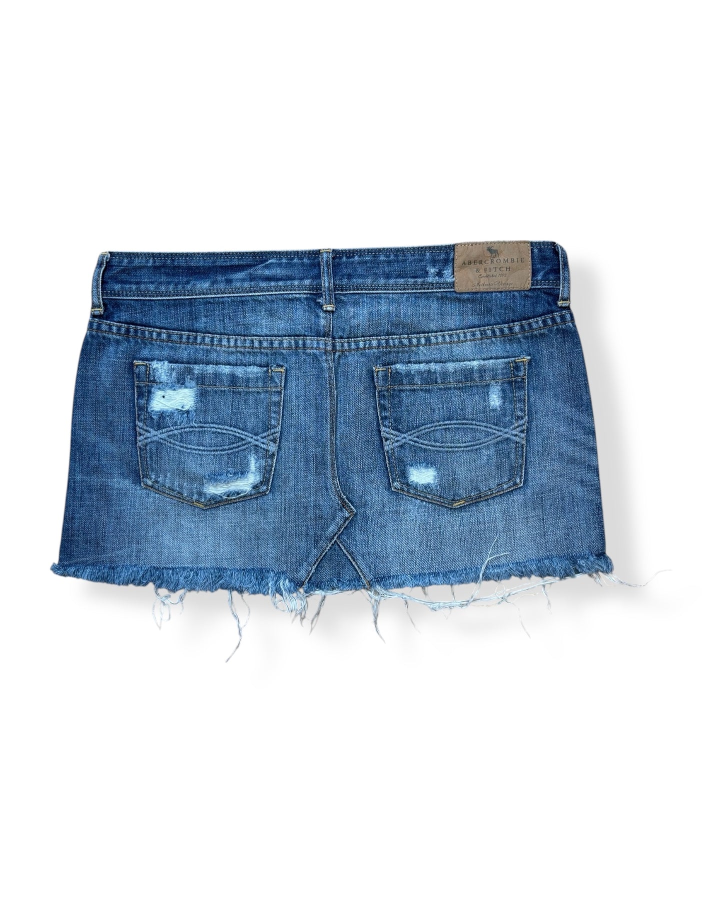 DISTRESSED DENIM MINI SKIRT